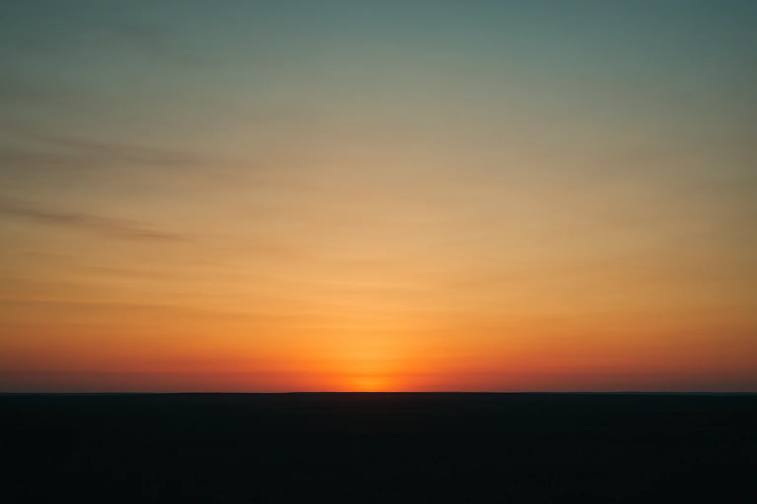 A quiet horizon at sunset symbolizing the loss of cultural memory and disappearing traditions