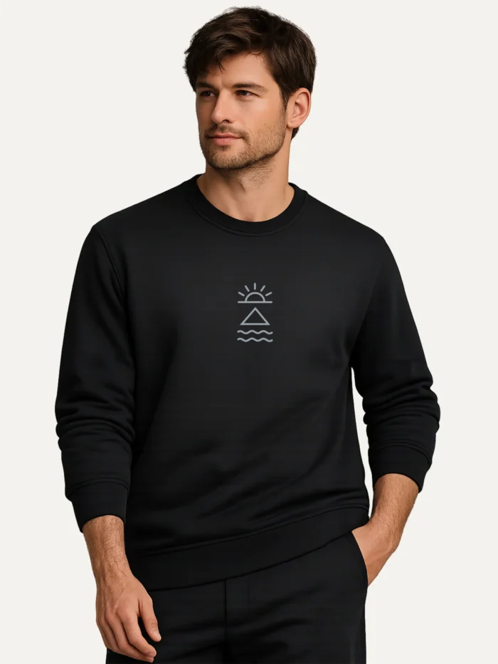 Male model wearing Horizon Mark organic cotton sweatshirt in Black Ink
