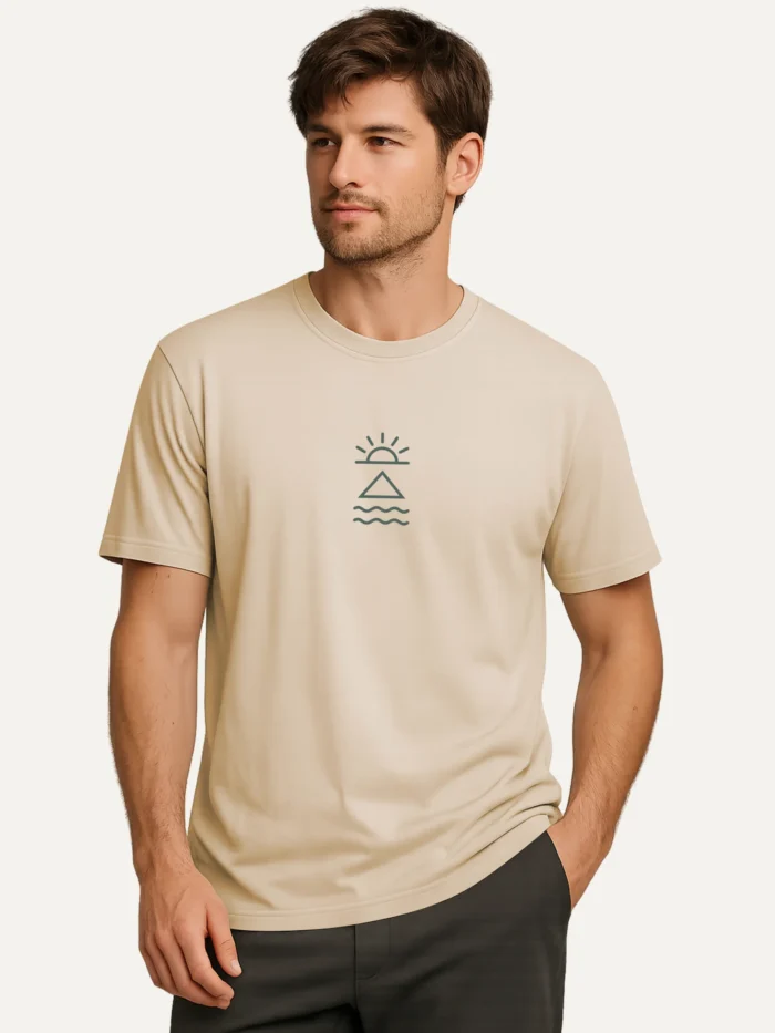Male model wearing Desert Dust organic cotton t-shirt with forest green Horizon Mark print