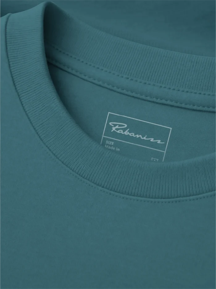 close up of organic cotton t-shirt rib collar and inner label in stargazer blue