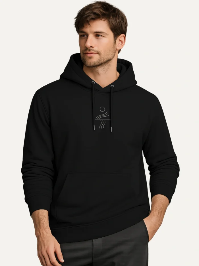 man wearing black organic cotton hoodie with minimal solar current line artwork
