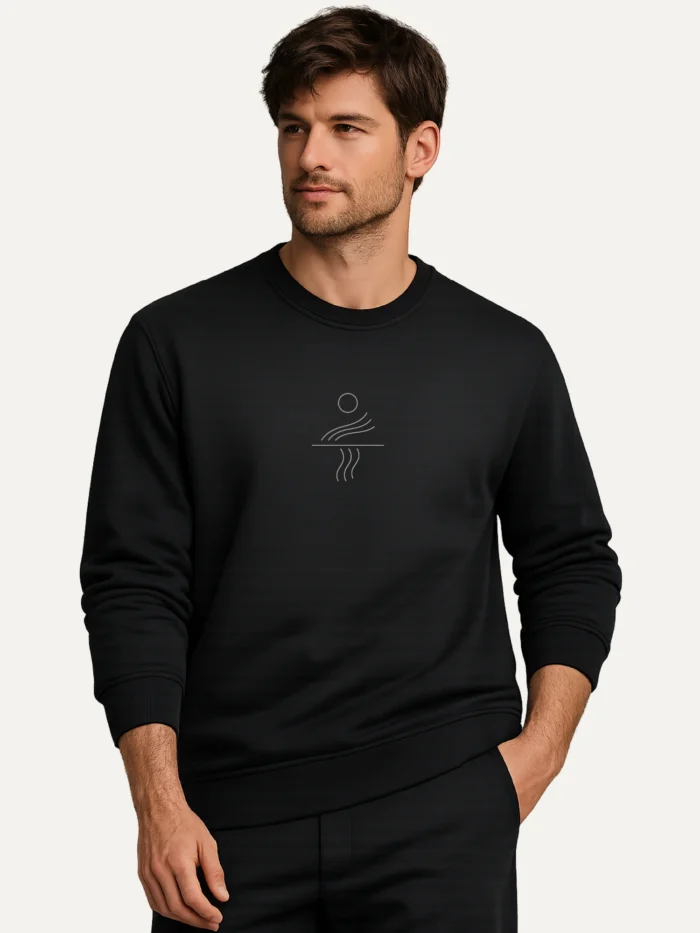 man wearing black organic cotton sweatshirt with minimal solar current line artwork