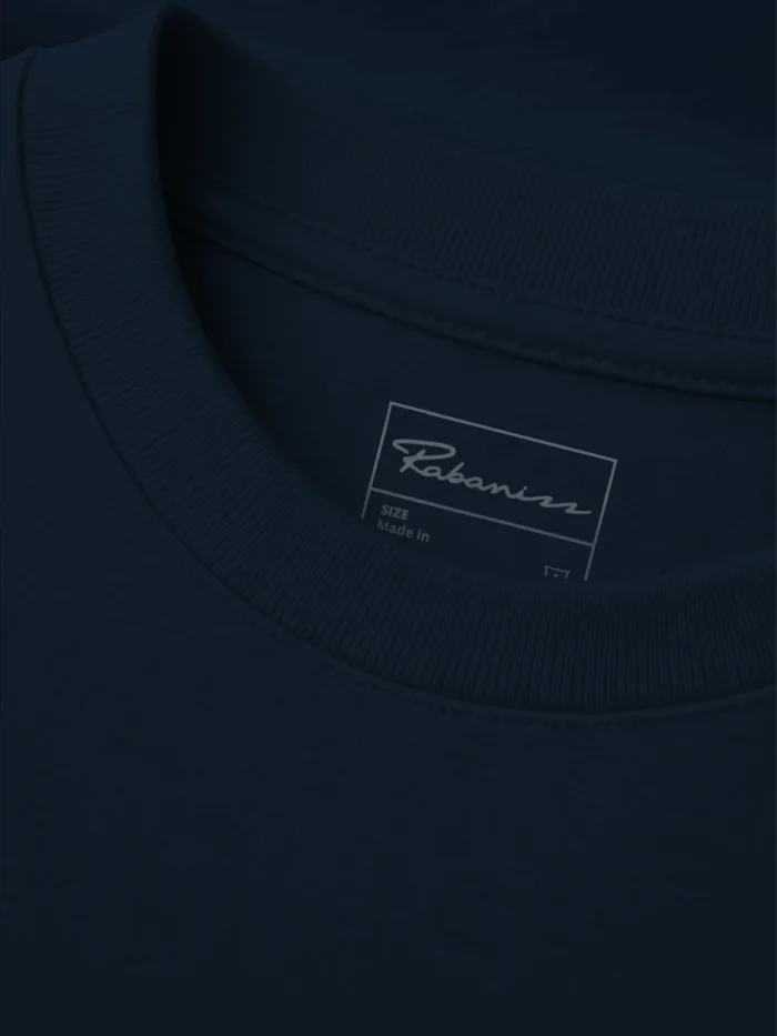 Close up of rib collar and inside label on french navy organic cotton t-shirt