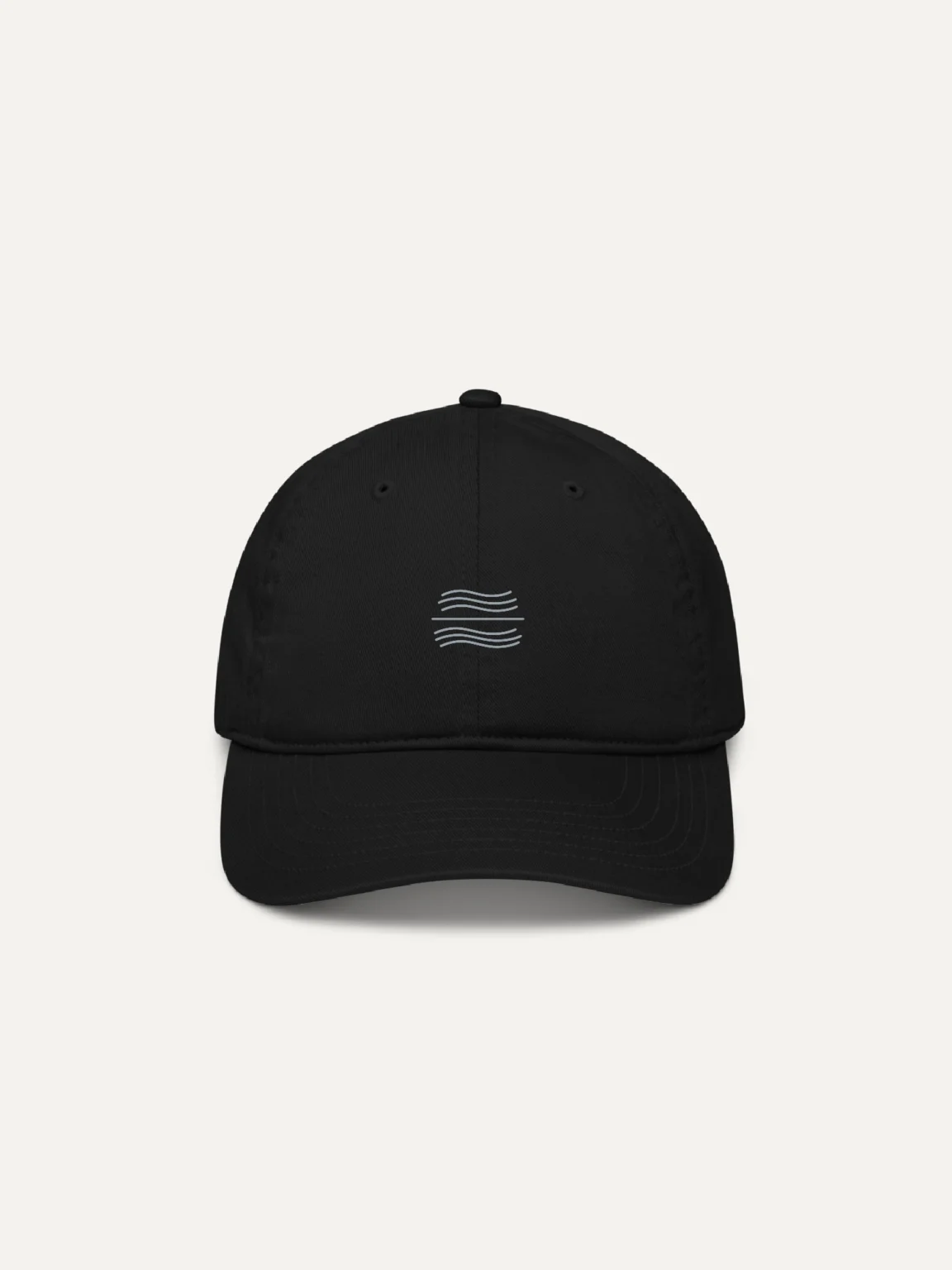 black organic cotton twill cap with tidal balance wave embroidery front view