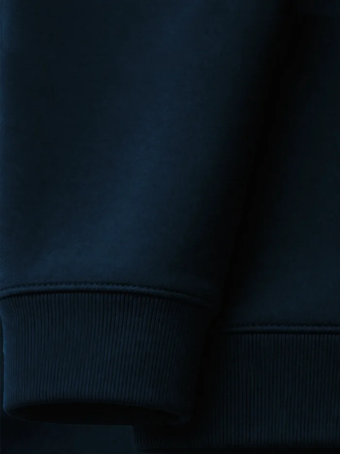 French navy organic sweatshirt cuff and hem rib detail close-up