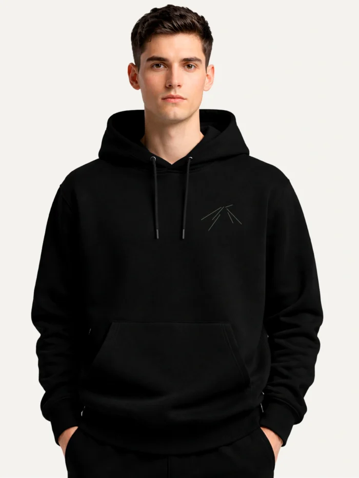 black organic hoodie front view worn minimal chest design
