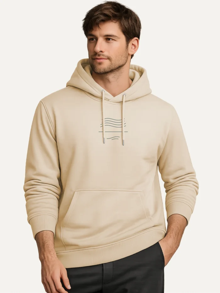 Male model wearing Wind Flow organic hoodie desert dust minimal climate inspired graphic