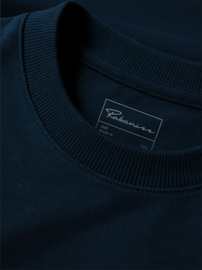 Wind Flow organic sweatshirt French navy rib collar and interior label detail