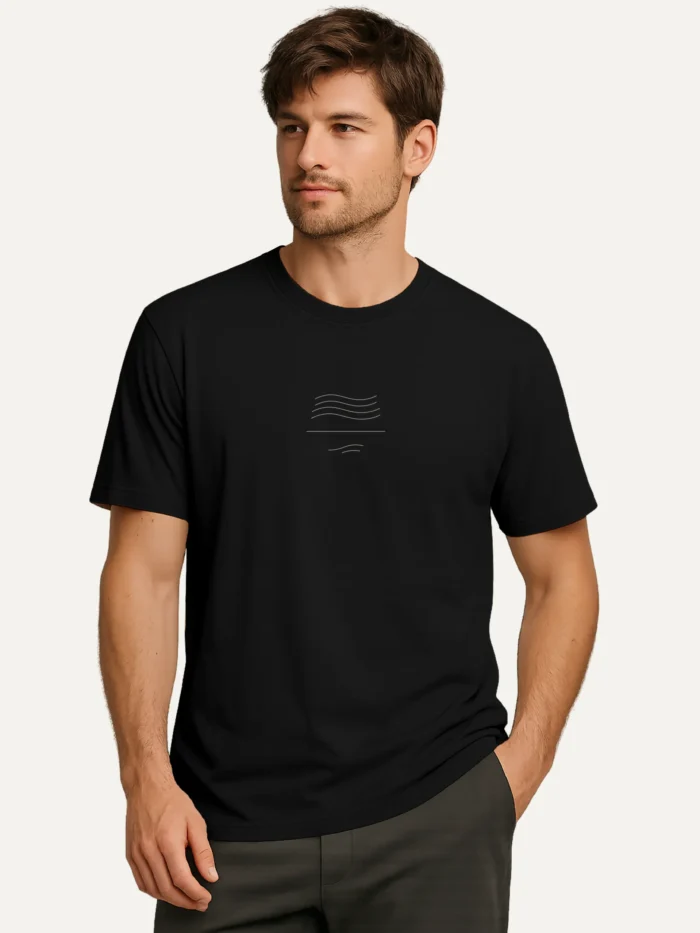 Male model wearing Wind Flow organic cotton t-shirt in black ink