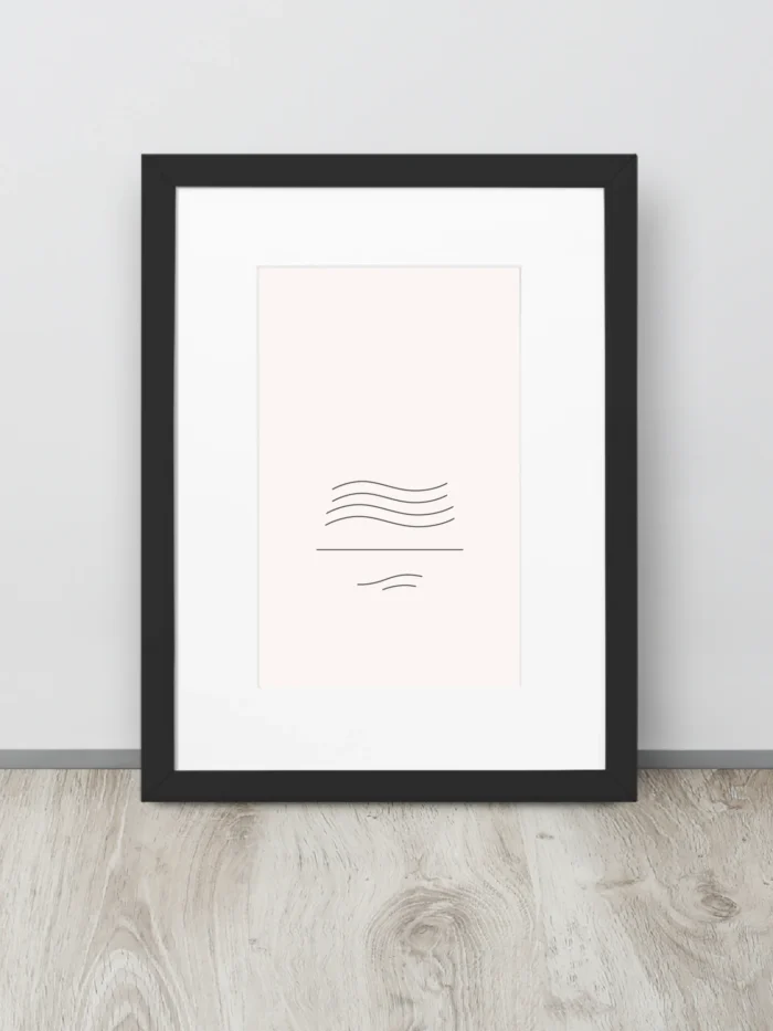 Framed minimal wind flow line artwork leaning on floor against wall with wooden flooring