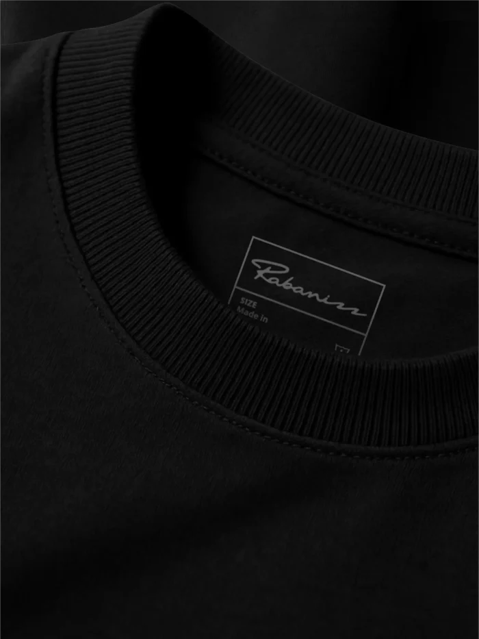 Black sweatshirt neckline with inner label detail