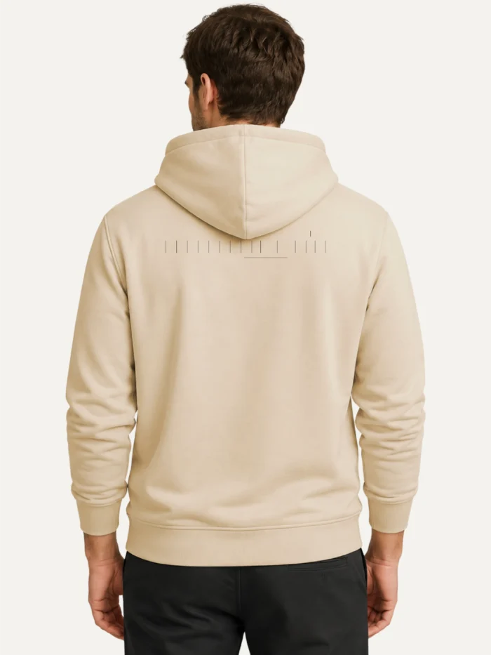 Male model wearing Desert Dust Seasonal Index hoodie from back