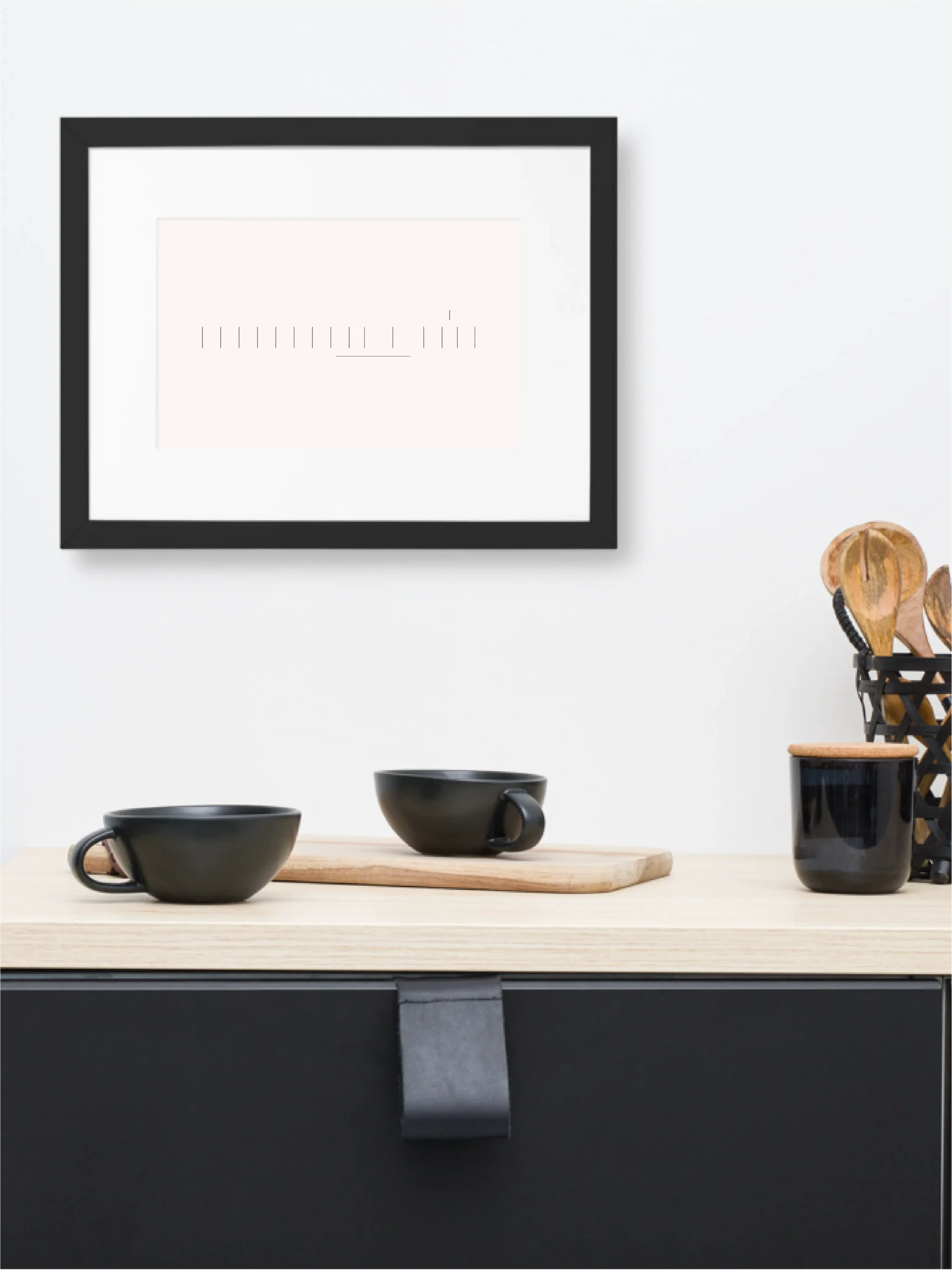 Seasonal Index framed art displayed in a minimal kitchen interior