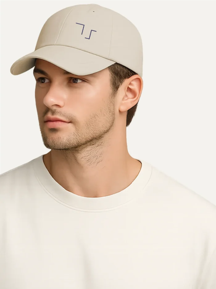 Model wearing Held Insert Oyster organic cotton twill cap
