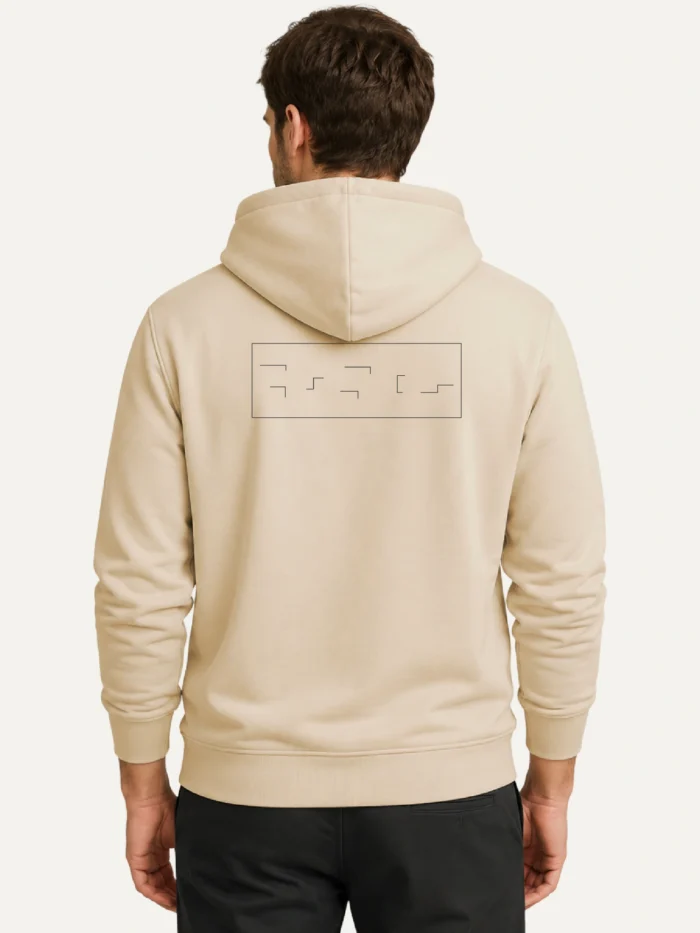 Model wearing Held Insert Desert Dust hoodie with back artwork