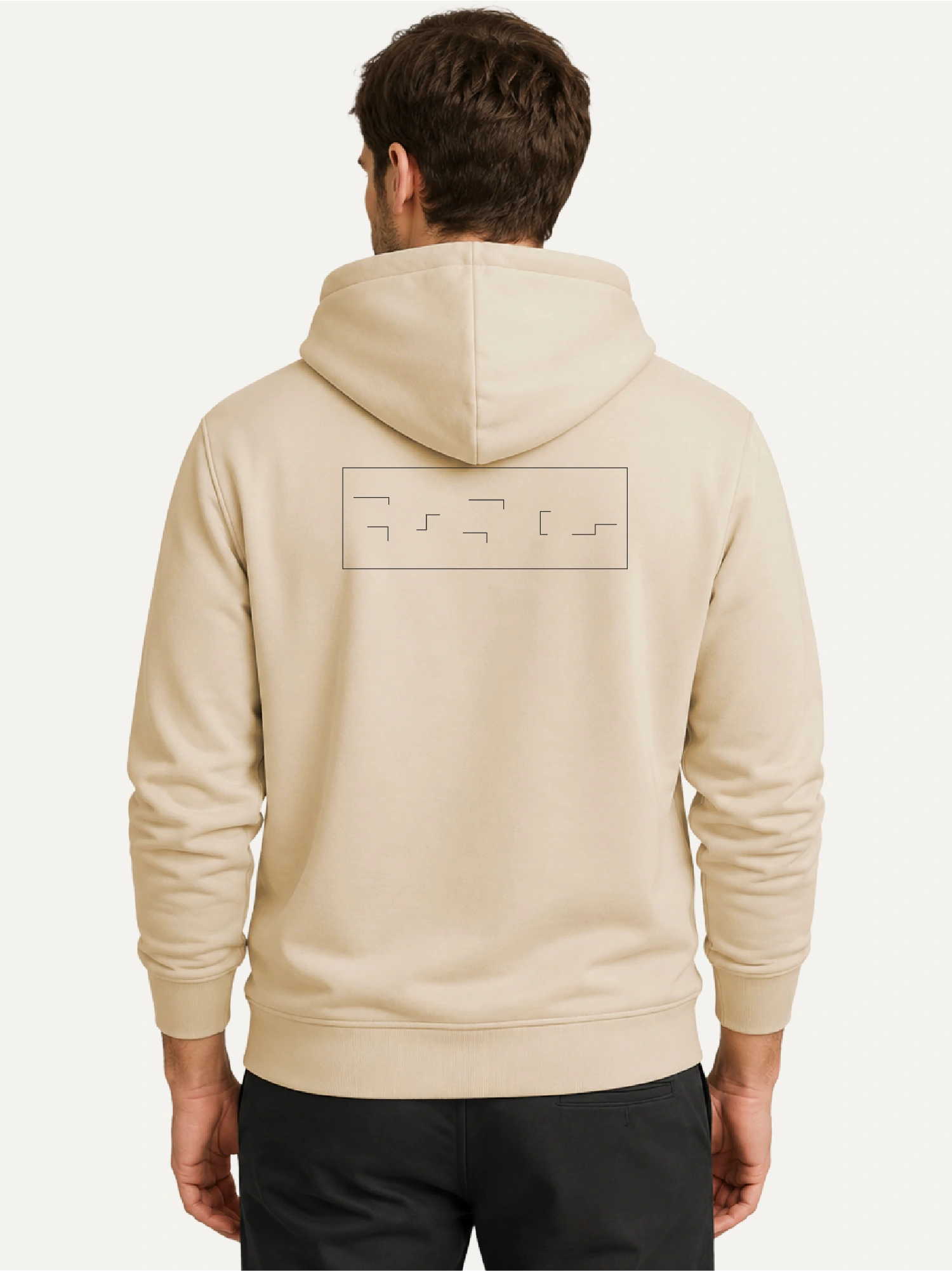 Model wearing Held Insert Desert Dust hoodie with back artwork