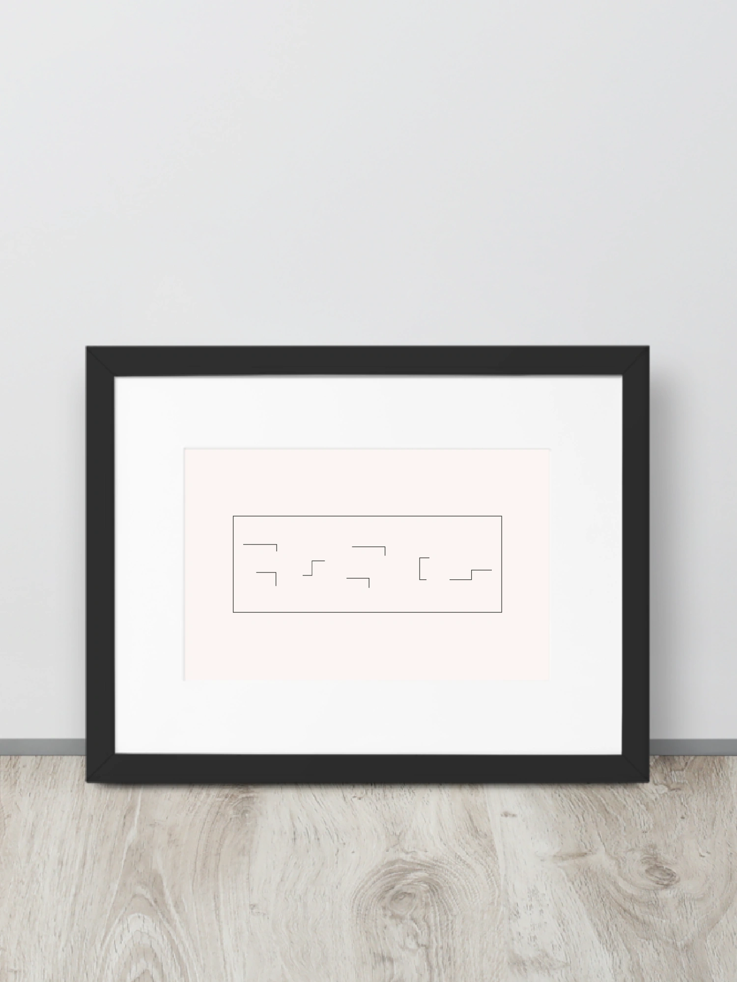 Held Insert framed art print leaning against a wall