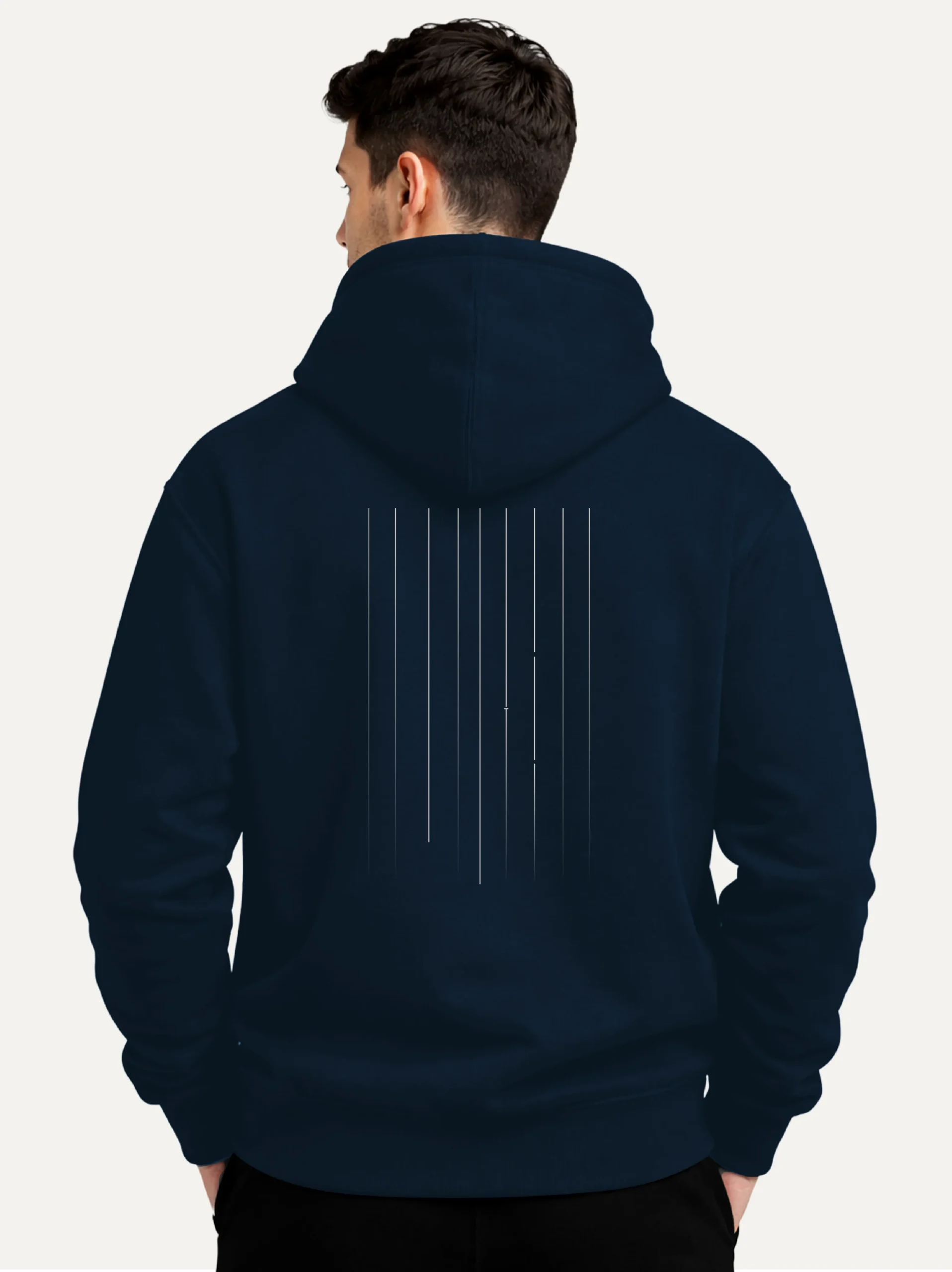 Male model showing Material Lineage artwork on French Navy hoodie