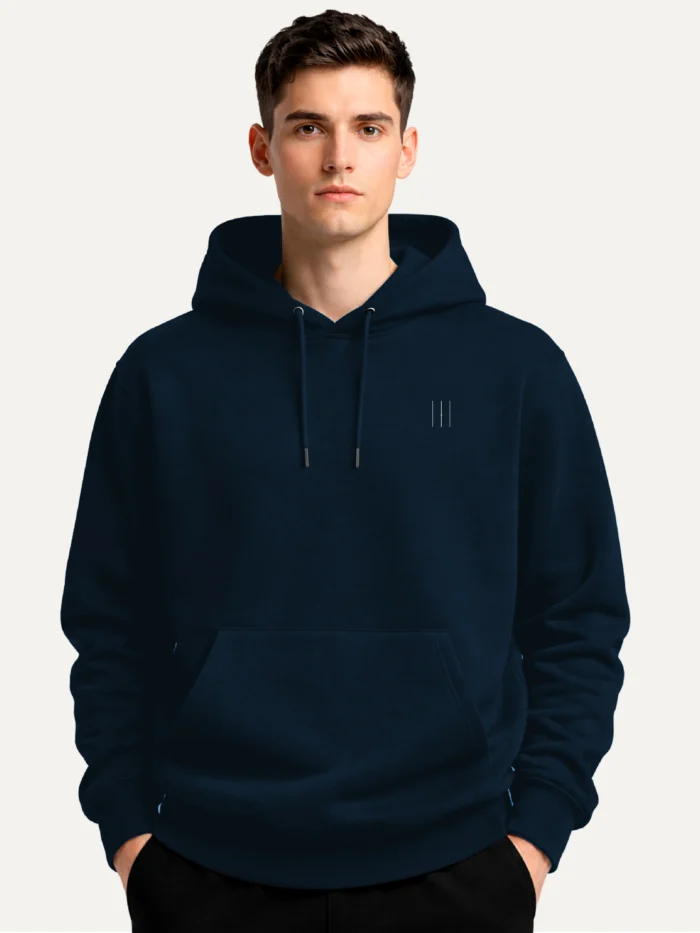 Male model wearing French Navy hoodie with minimal chest signal