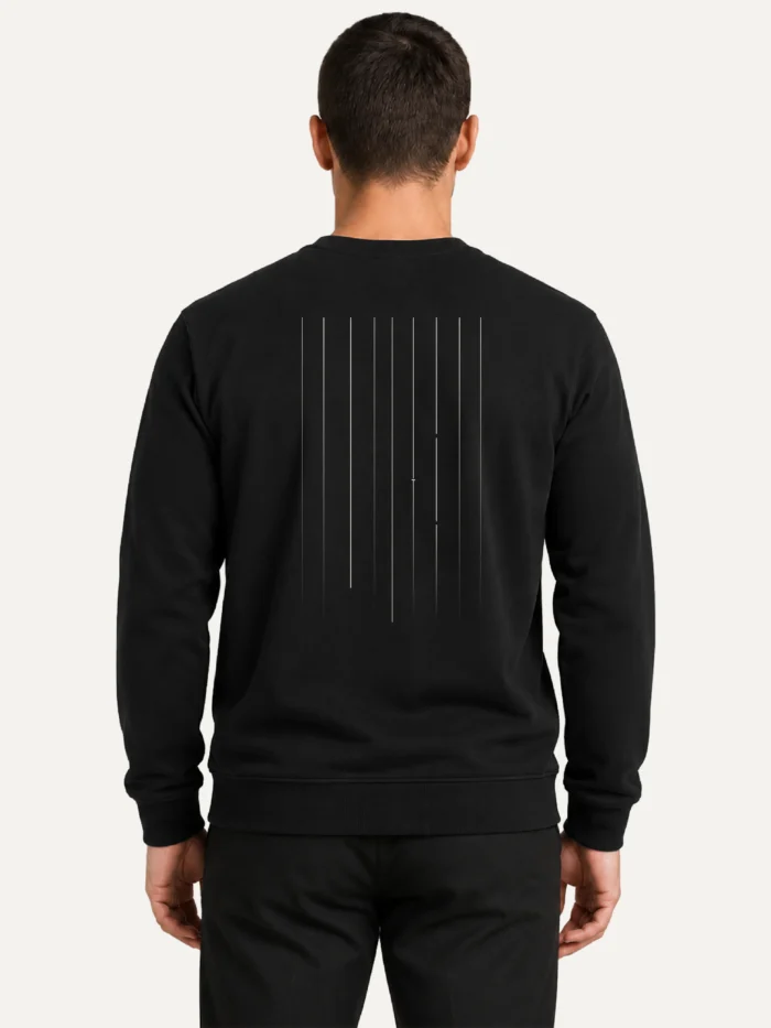Male model wearing black Material Lineage sweatshirt from the back