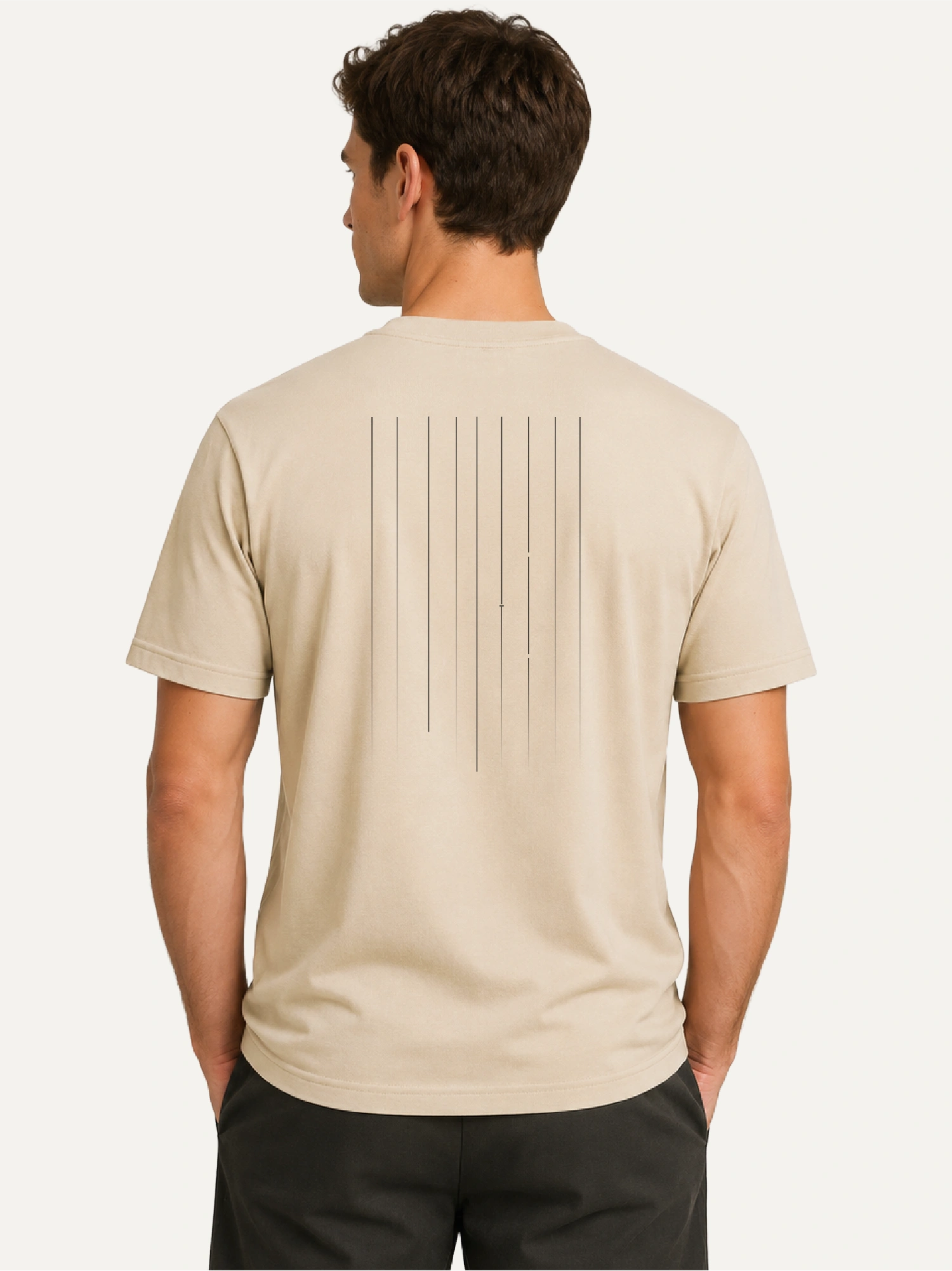 Male model wearing Desert Dust Material Lineage T-shirt from back