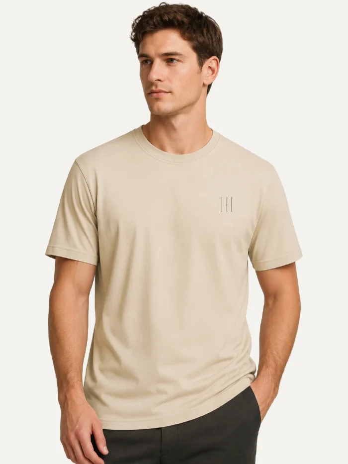 Male model wearing Desert Dust Material Lineage organic T-shirt