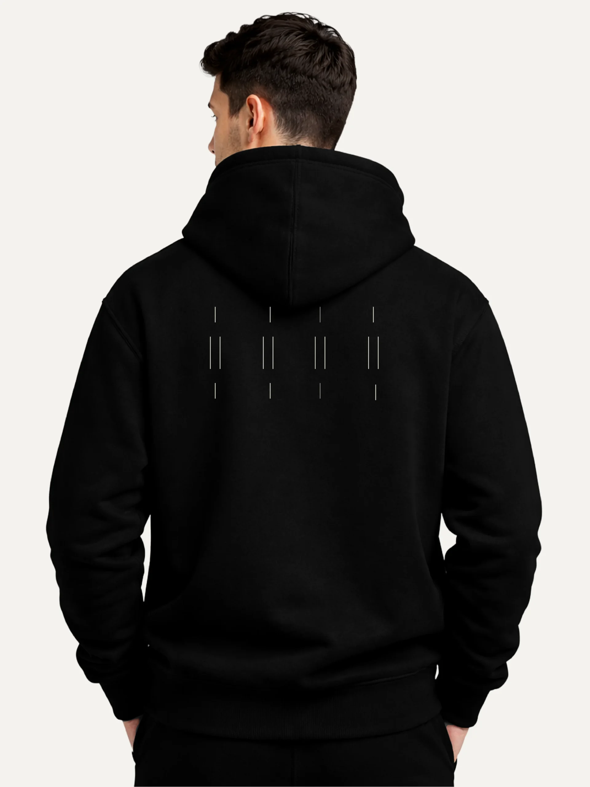 Model wearing black Memory Relay hoodie with grouped Stone White back artwork