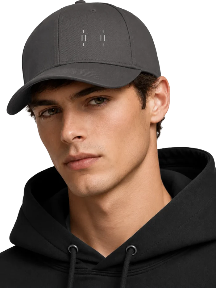 Male model wearing Charcoal Memory Relay organic cotton twill cap