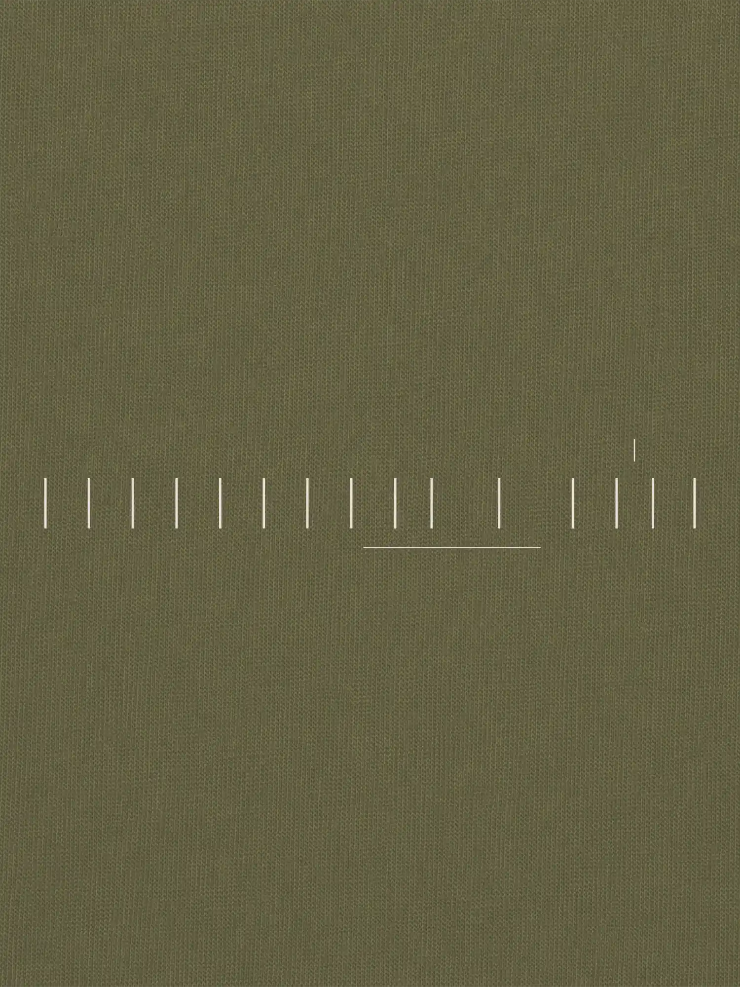Close-up of Stone White Seasonal Index print on Khaki Soil cotton