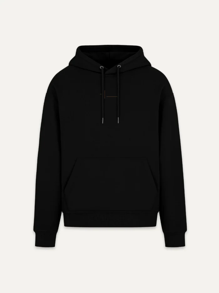Displaced Ground Organic Cotton Hoodie — Black, front view with reduced Clay Brown intersection at the centre chest.