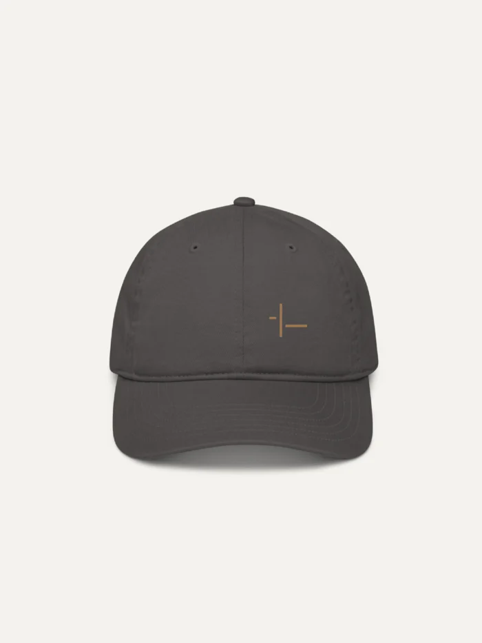 Displaced Ground Organic Cotton Twill Cap — Charcoal, front view with Old Gold embroidered intersection on the wearer’s left panel.