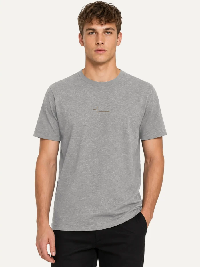 Model wearing the Displaced Ground Organic Cotton T-Shirt — Heather Grey