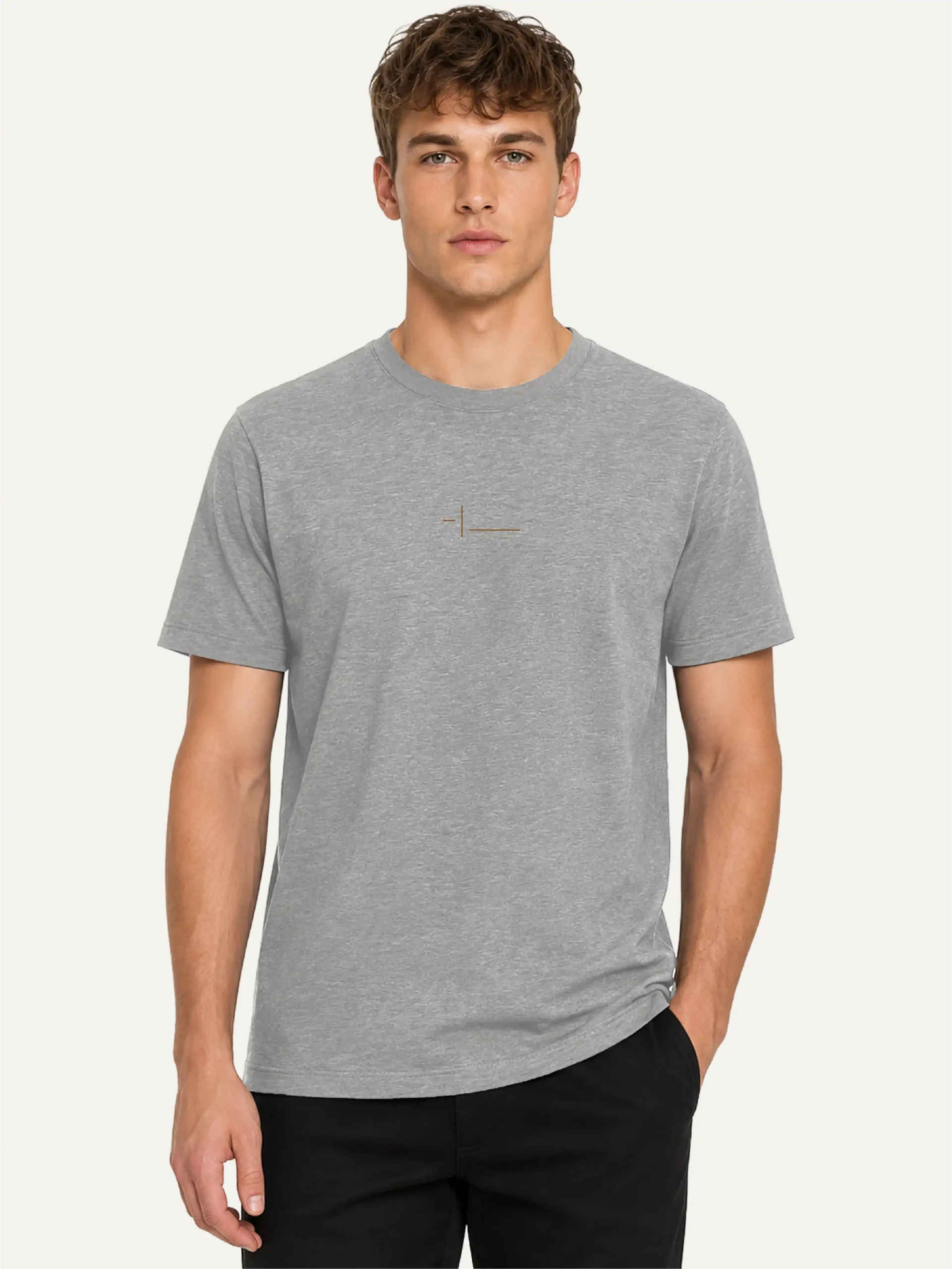 Model wearing the Displaced Ground Organic Cotton T-Shirt — Heather Grey