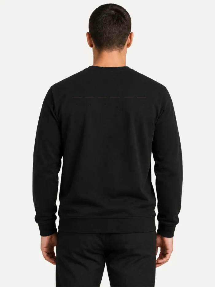 Model wearing black Return Interval sweatshirt from the back
