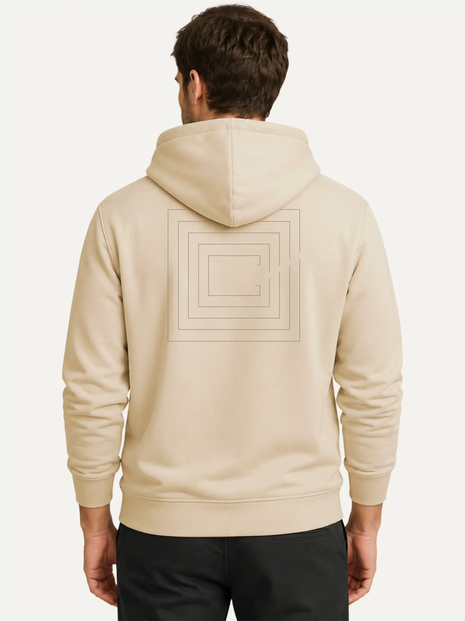 Model wearing Desert Dust Second Look hoodie showing geometric back artwork