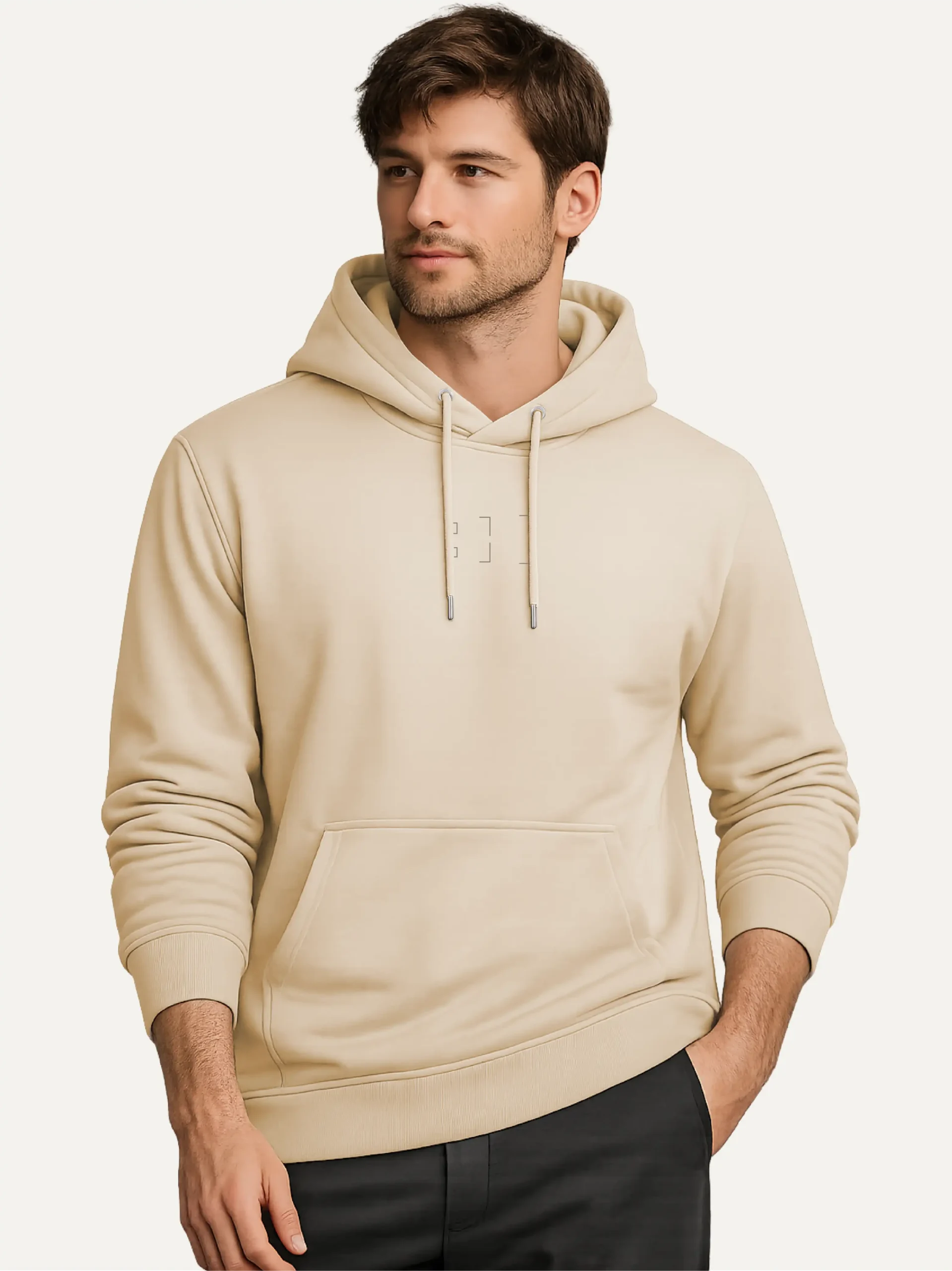 Model wearing Desert Dust Second Look hoodie with minimal centre-chest print