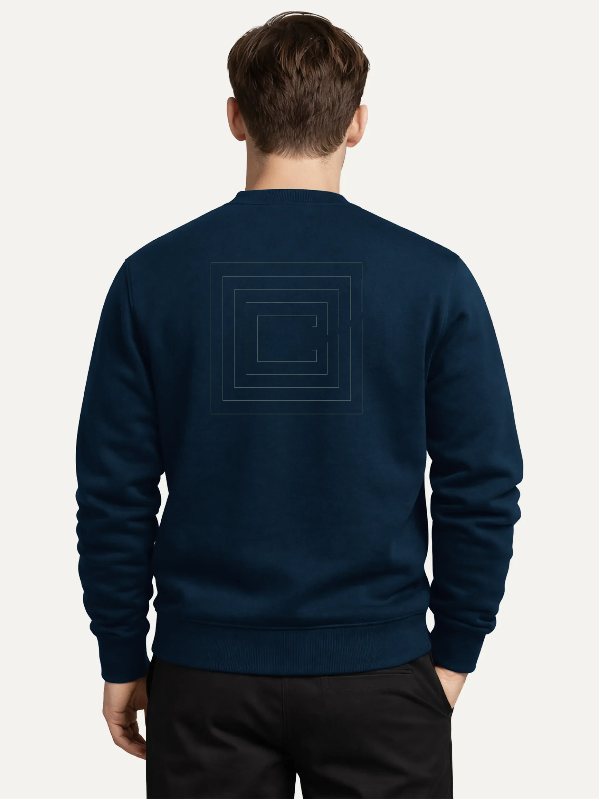 Model wearing a French Navy Second Look organic cotton sweatshirt, viewed from behind with nested contour artwork on the back.