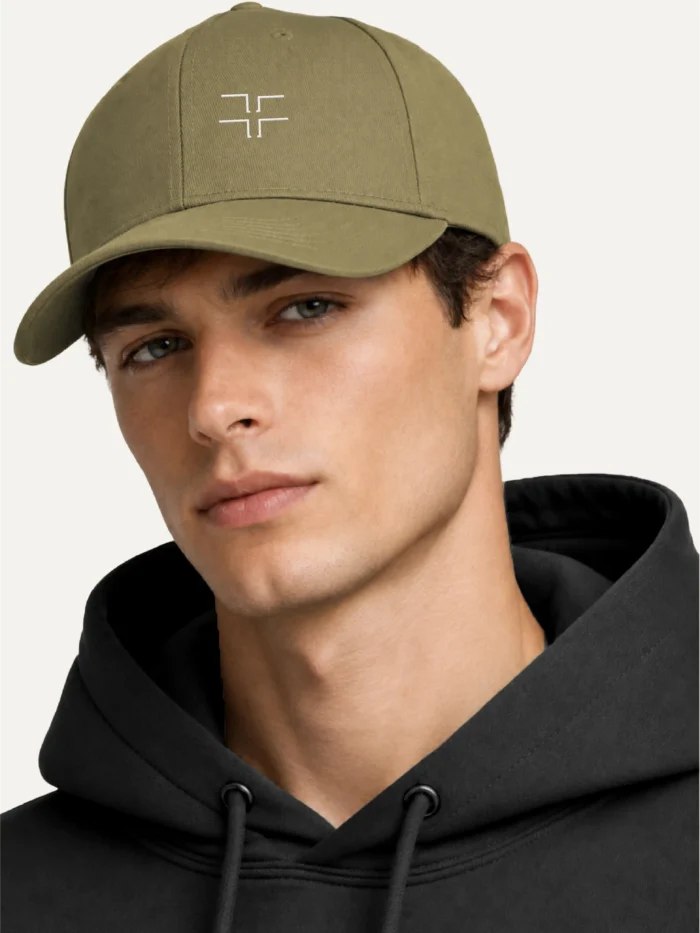 Model wearing Shared Count Jungle organic cotton embroidered cap