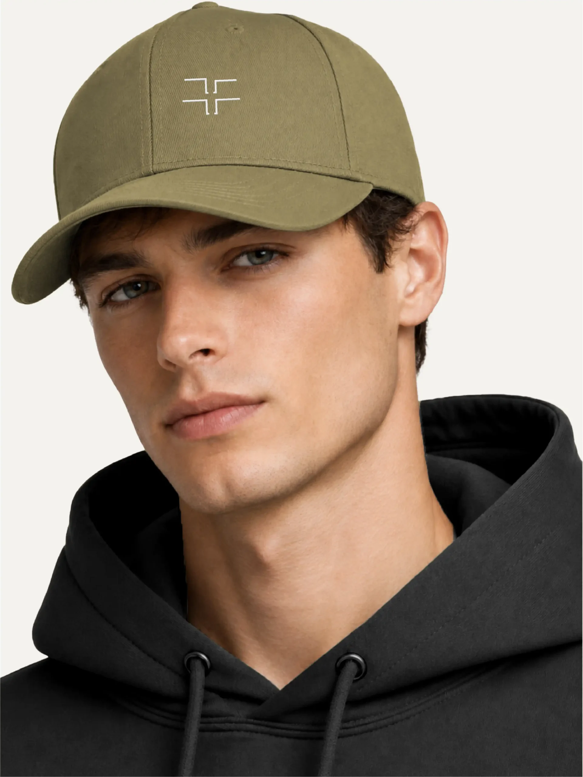Model wearing Shared Count Jungle organic cotton embroidered cap